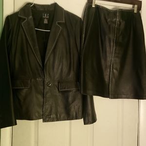 A genuine leather skirt set jacket size 10, skirt size 12 very good condition